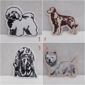 May include: Four embroidered iron-on patches of different dog breeds. The patches are white with black outlines. The dogs are a white fluffy dog, a brown and white dog, a black dog, and a white dog.