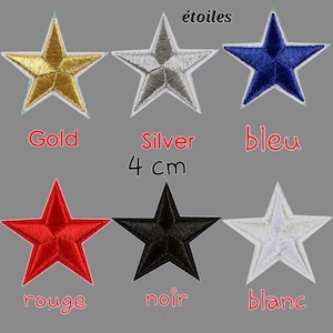 May include: Six embroidered iron-on patches in the shape of a five-pointed star. The stars are in the colors gold, silver, blue, red, black, and white. The text "étoiles" is at the top of the image. The text "4 cm" is in the middle of the image. The text "Gold", "Silver", "bleu", "rouge", "noir", and "blanc" are below the stars.