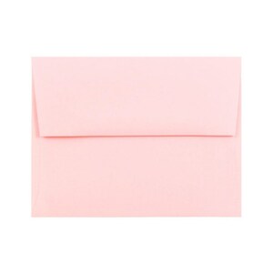 May include: A light pink envelope.