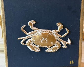 Gold Embossed Crab Intaglio on Navy Canvas – Coastal Elegance Framed in Gold (6"x6"x1")