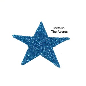 May include: A blue glitter star with the text "Metallic The Azores" above it.