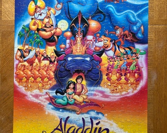 Vintage/ 1990’s/ Walt Disney pictures presents/ Aladdin/ 300 piece/ Movie Poster Puzzle/ 2 x 3 feet/ Complete?/ 300+ pieces/ Good Condition