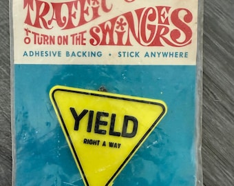 New Old Stock/ Vintage/ 1968/ Timely Traffic Signs/ To turn on the Swingers/ Stick Anywhere/ Yield Sign