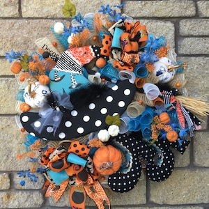 Chic Witch Halloween Wreath: Plush Boots, Broom, Elegant Decor