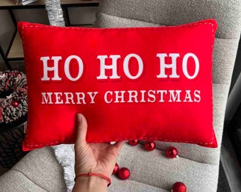 "Rotes Weihnachtskissen: ""Ho Merry"" Festliches Dekokissen."