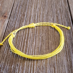 Stackable String Bracelet | Adjustable, Waterproof  | Yellow Polyester Waxed Cord