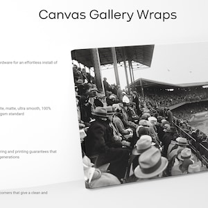 May include: Black and white photo of a baseball game printed on a gallery wrapped canvas. The canvas has a hard sealed backing and comes with hanging hardware. The canvas is made of 100% cotton and is printed on a natural white, matte, ultra smooth, 400gsm standard canvas. The canvas has taut corners and is guaranteed to last for generations.