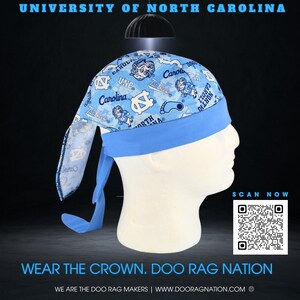 May include: A light blue doo rag with a pattern of UNC logos and text. The doo rag has a light blue band and ties. The text "UNIVERSITY OF NORTH CAROLINA" and "WEAR THE CROWN. DOO RAG NATION" are also visible.