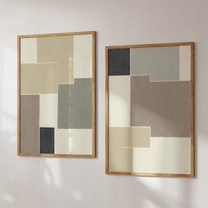 Könnte beinhalten: Zwei gerahmte abstrakte Kunstdrucke mit geometrischen Formen in Beige-, Braun-, Grau- und Weißtönen.