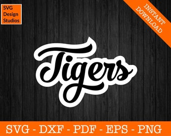 May include: Black and white graphic design of the word "Tigers" in a stylized script font. The design is on a woodgrain background.