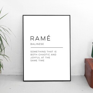 May include: Black and white typography print with the Balinese word "Ramé" defined as "something that is both chaotic and joyful at the same time".