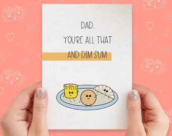 May include: A white card with a cute illustration of dim sum on a plate. The card reads "Dad, you're all that and dim sum."