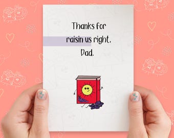 May include: A white card with a purple stripe and the text "Thanks for raisin us right. Dad." A cartoon box of raisins with a smiling sun and grapes is below the text.
