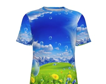 May include: A blue and green t-shirt with a graphic print of a field of grass, flowers, and mountains with soap bubbles floating in the sky.