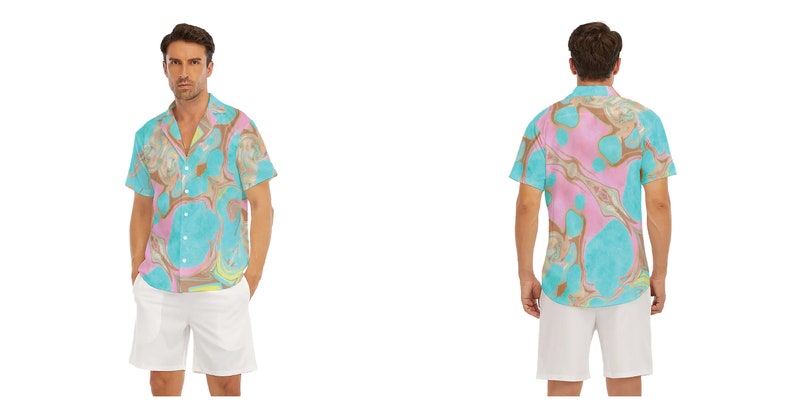 May include: A short-sleeved button-down shirt with a colourful abstract print. The shirt has a relaxed fit and a collar. The model is wearing white shorts.