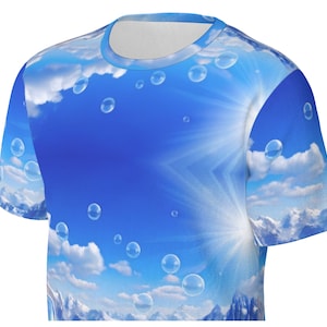 May include: A blue t-shirt with a sky and clouds print featuring white bubbles. The shirt has short sleeves and a crew neck.