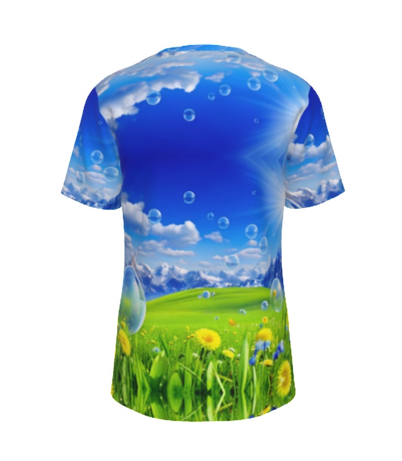 May include: A blue and green t-shirt with a graphic print of a field of grass, flowers, and mountains with a blue sky and white clouds with bubbles floating in the sky.