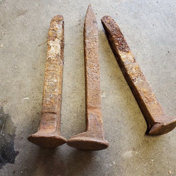 antique rail road spikes