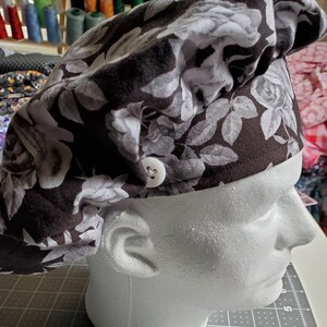 Roses on black bouffant w toggle n buttons