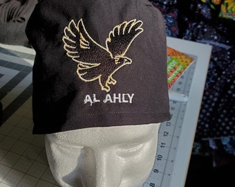Al Ahly con gorro quirúrgico negro con lazo