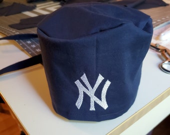 NY Yankees tie back scrub hat and knit hats -- Assorted colors