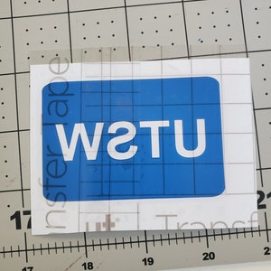 UTSW sticker w cut out letters, inside window version