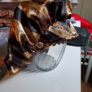 Satin animal bouffant w buttons n toggle