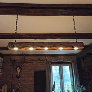 Rustic beam lamp. Atmospheric hanging lamp. Lamp from old beam. Wooden lamp on chains. Rustic style lighting