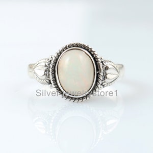 Ethiopian Opal Ring: Sterling Silver Statement Ring (7X9 MM)