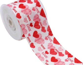 May include: White satin ribbon with a repeating pattern of red and pink hearts and the word "LOVE" printed on it.