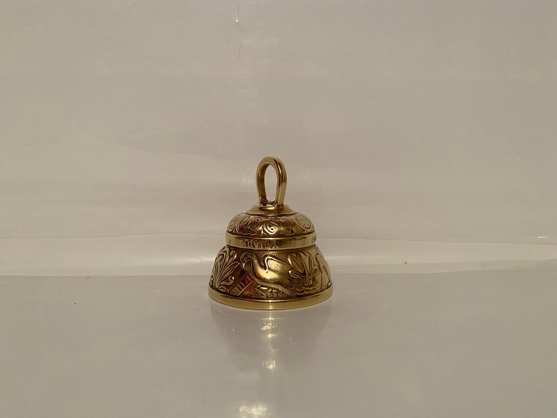 brass bird bell