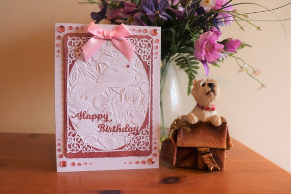 Handmade Birthday Card, Embossed bird background, textured and die cut pink and white frame, faux gems and pink bow