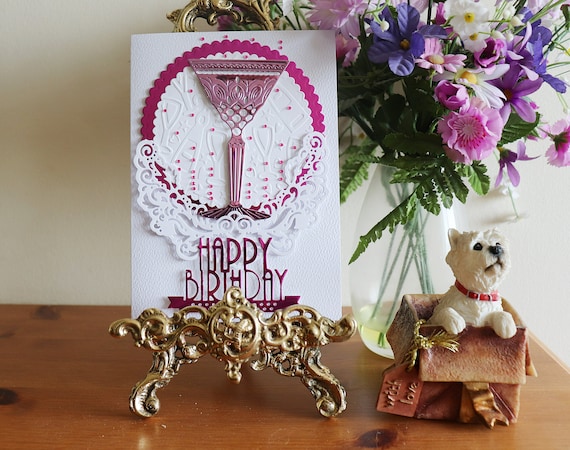 Handmade Birthday Card, Cocktail Glass in pink metallic card, pink sparkly beads. Art Deco sentiment and celebratory embossed background .