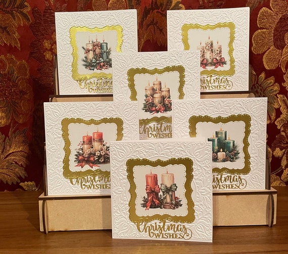 Pack of 6 Different Handmade Christmas Cards with candles and fancy border,  Each with the message ‘Christmas Wishes’.