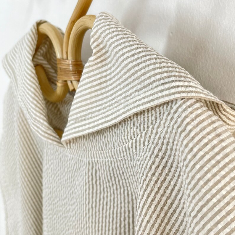 Poncho for children in beige striped cotton image 2