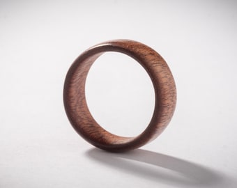 Minimalist wooden band ring from mahogany wood