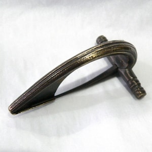 Roman bronze curve brooch