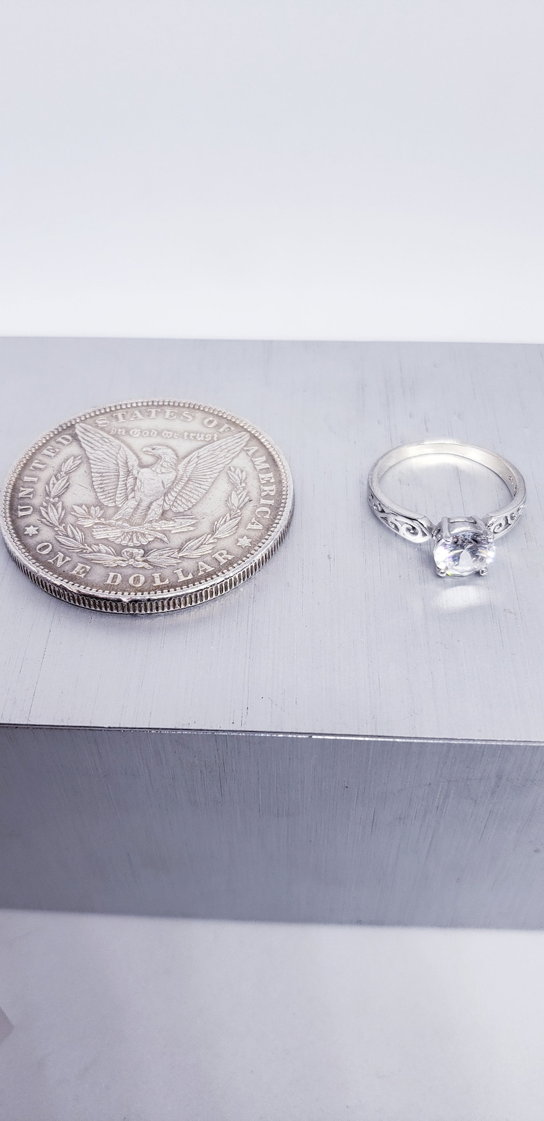Scroll Design Shank Sterling Silver CZ Solitaire Engagement Ring