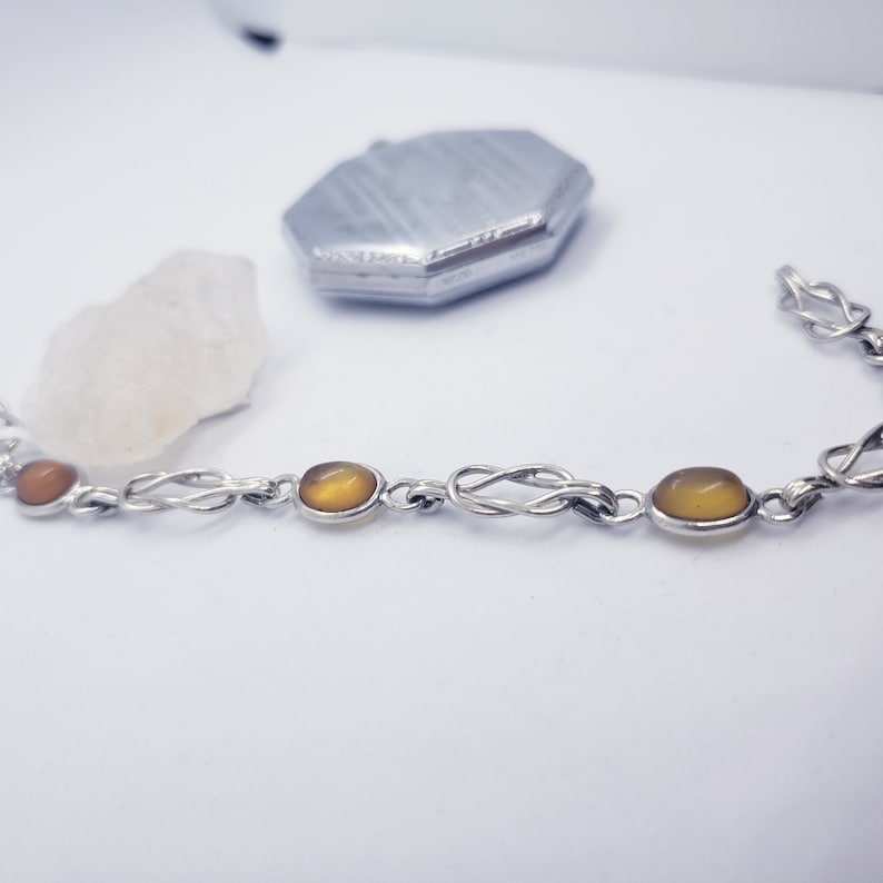 7 Inches Sterling Silver Oval Amber Cabochon Bracelet with Interlocking Loop Links