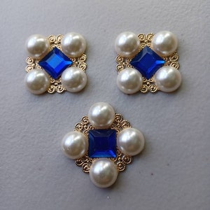 Regal ouches with blue stone