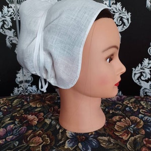 Linen coif with ties for securing around hair