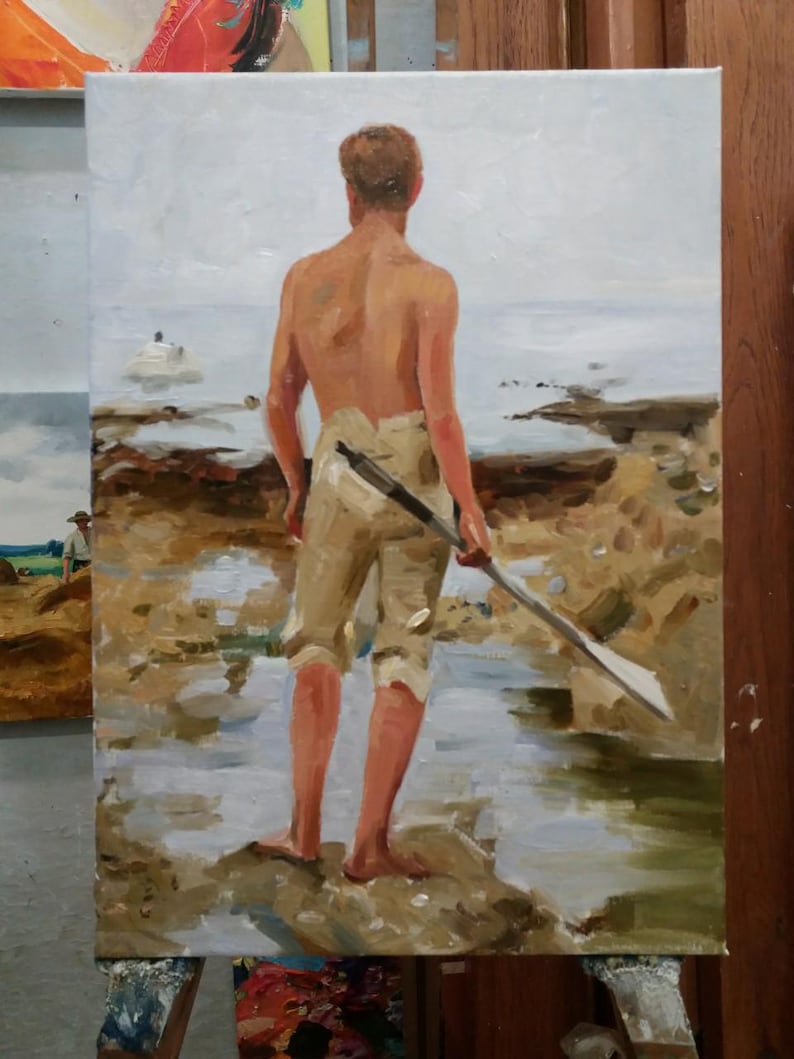 May include: Oil painting of a person standing on a rocky shore, facing the ocean. The person is shirtless, wearing tan pants, and holding an oar. The painting has a muted color palette with shades of brown, beige, and blue.