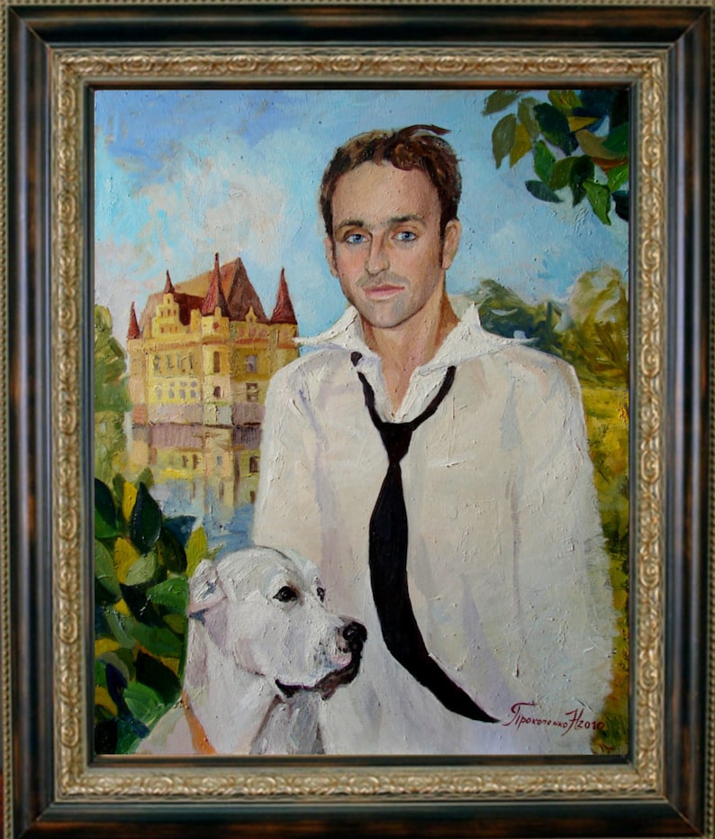 May include: Oil painting portrait of a man with a white shirt and black tie, and a white dog. A castle is in the background. The painting is in a gold and black ornate frame.