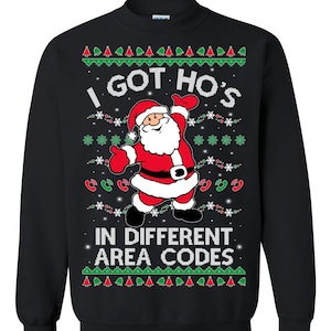May include: Black Christmas sweater with a Santa Claus graphic and the text "I got ho's in different area codes".