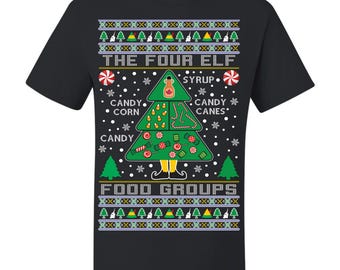May include: Black t-shirt with a Christmas tree design. The tree is decorated with candy and syrup, and the text reads "THE FOUR ELF FOOD GROUPS." The design has a festive, holiday theme.