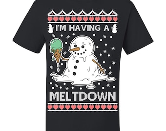May include: Black t-shirt with a graphic of a melting snowman holding an ice cream cone. The text "I'M HAVING A MELTDOWN" is above and below the snowman design. The design has a knitted sweater style border with red hearts.