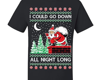 May include: Black t-shirt with a Christmas-themed graphic. The design features Santa Claus on a chimney, a crescent moon, and the text "I COULD GO DOWN ALL NIGHT LONG". The shirt has a festive pattern of gifts and snowflakes.