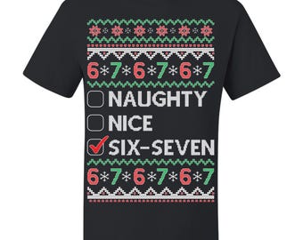 May include: Black t-shirt with a festive design. The shirt features a pattern of red and green elements, with the text "NAUGHTY", "NICE", and "SIX-SEVEN". The phrase "SIX-SEVEN" has a red checkmark. The shirt also has the numbers "6*7*6*7*6*7".
