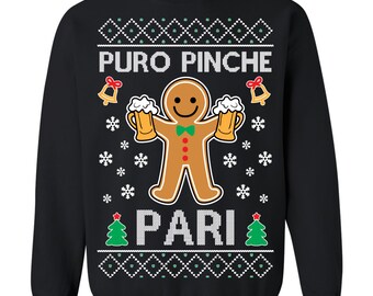 May include: Black sweatshirt with a gingerbread man graphic holding two mugs of beer. The text "PURO PINCHE PARI" is above and below the gingerbread man. The design includes snowflakes, bells, and Christmas trees.