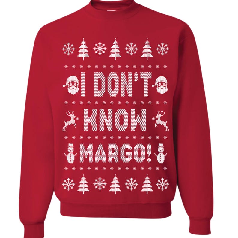 May include: Red Christmas sweater with a white knit pattern featuring snowflakes, Christmas trees, Santa Claus, reindeer, and a snowman. The sweater has the text "I DON'T KNOW MARGO!" in white.